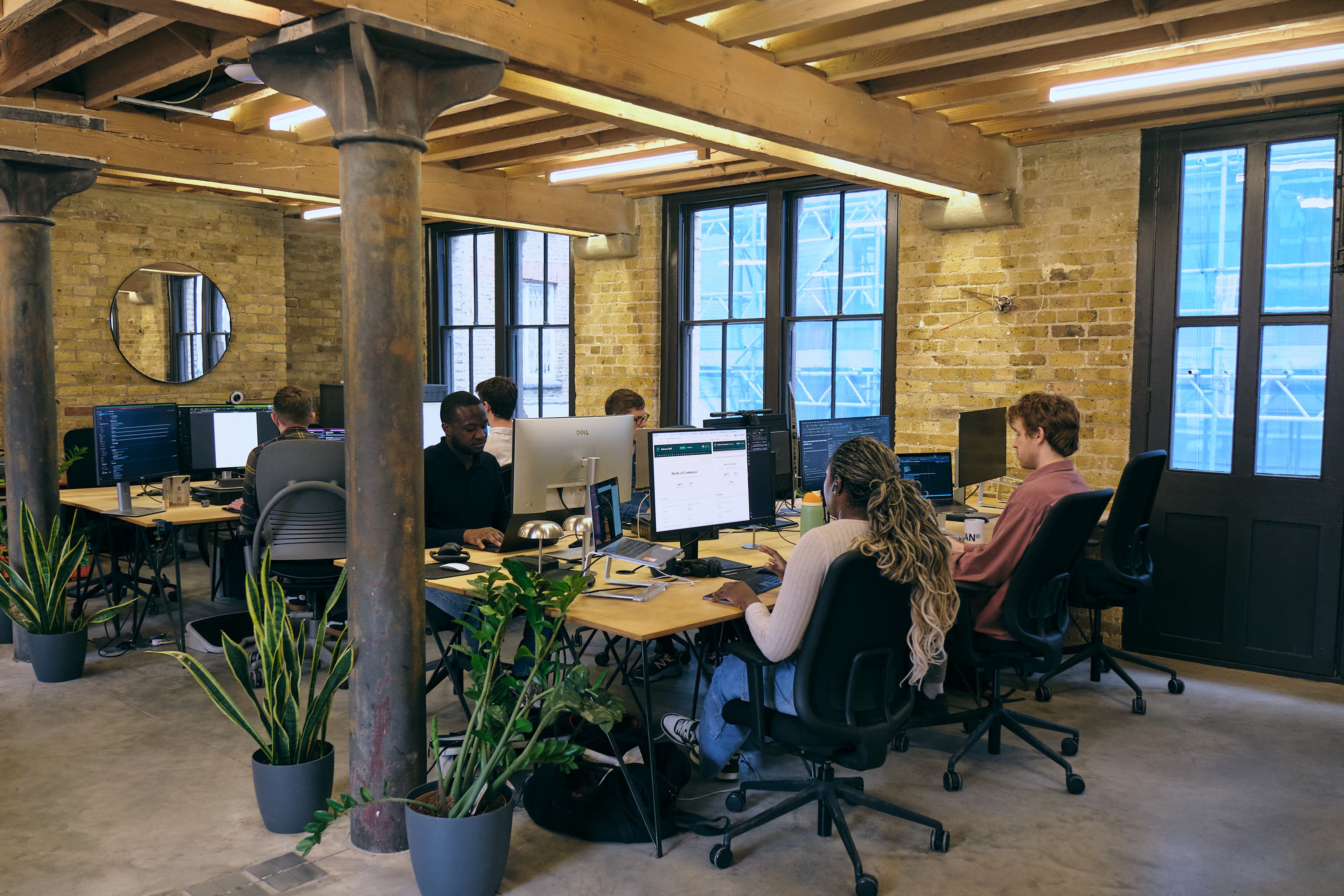 Team collaborating at desks